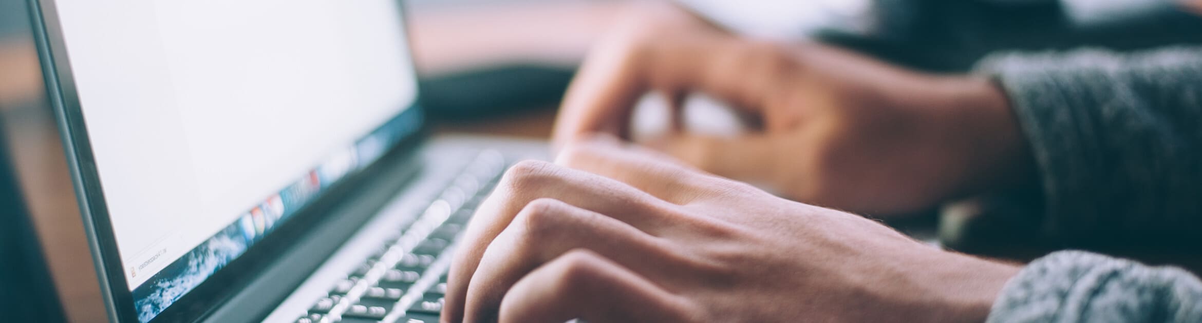 ADA compliant hands using a laptop ADA compliant hands using a laptop