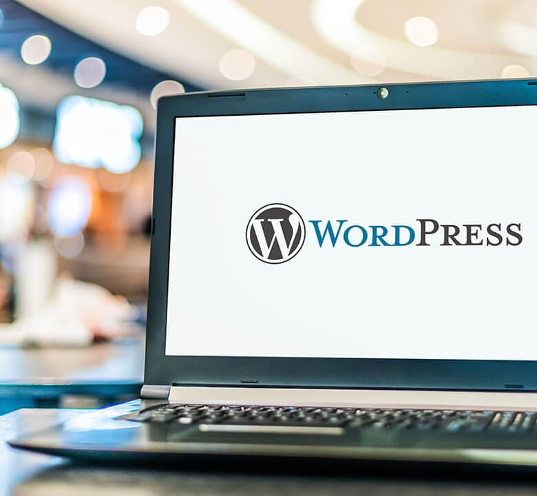 Laptop showing the WordPress logo