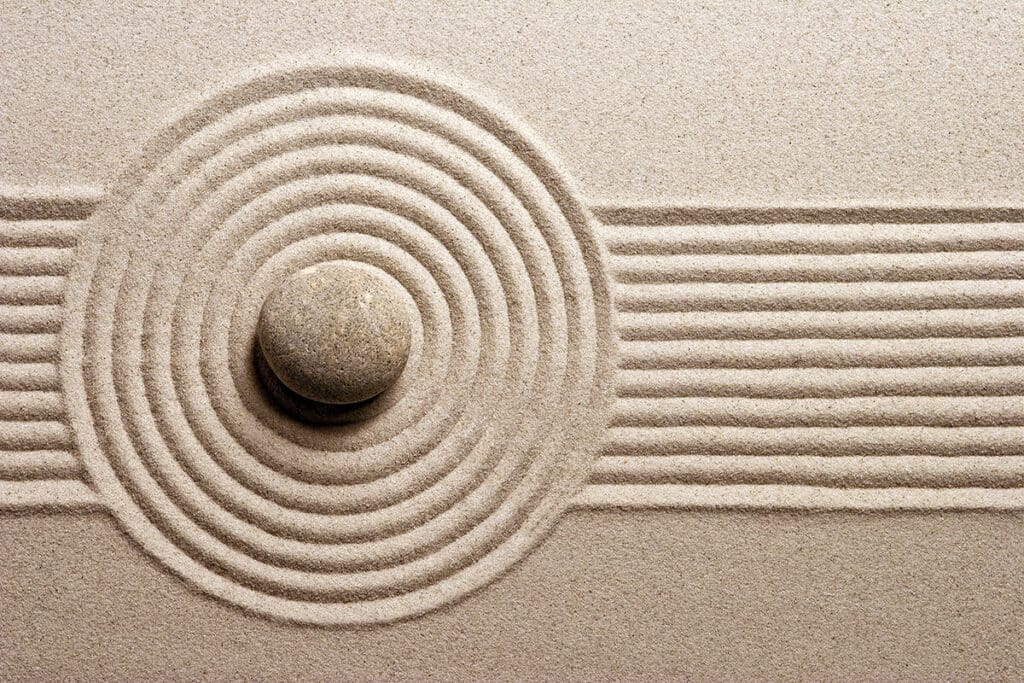 Sand art illustrates using intentional composition to improve user experience (UX).