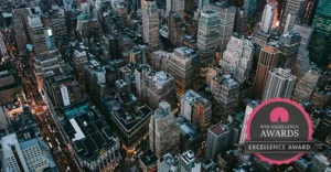 Cityscape photo with web excellence award badge for finance web design case study.