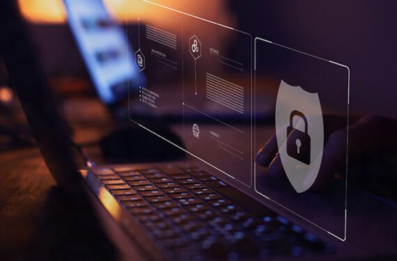 Laptop showing security icon representing GDPR for websites