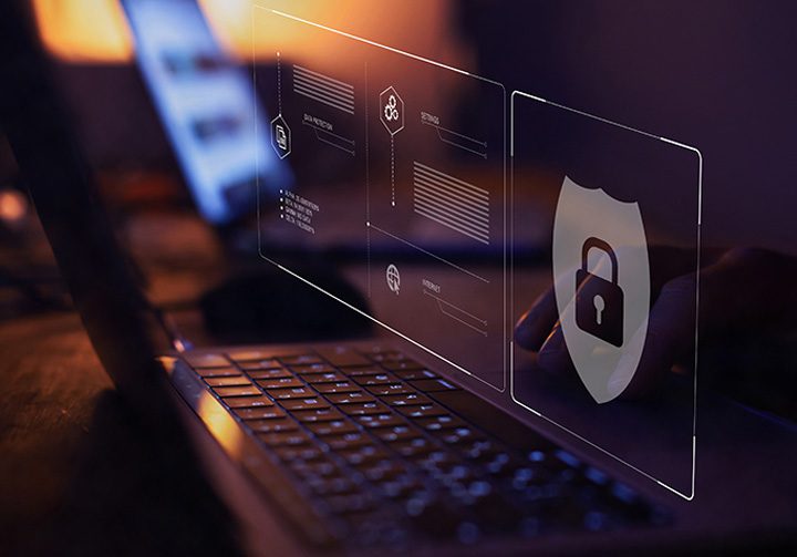 Laptop showing security icon representing GDPR for websites